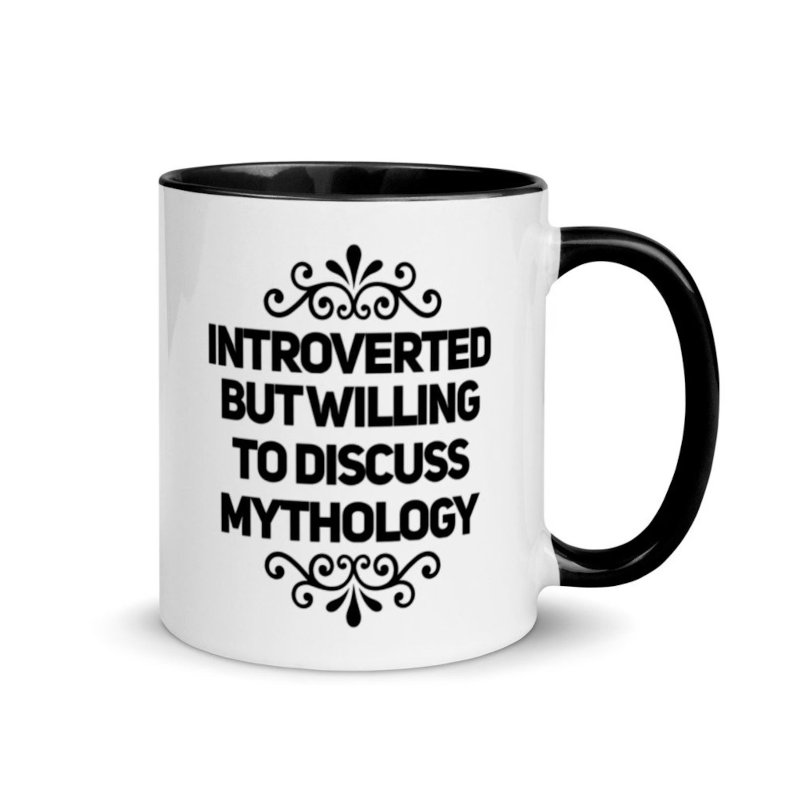 white mug with a black handle and black text that reads "introvert but willing to discuss mythology"
