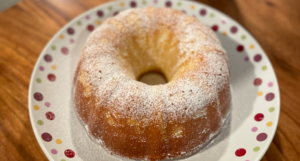 a photo of a light golden pound cake on a plate