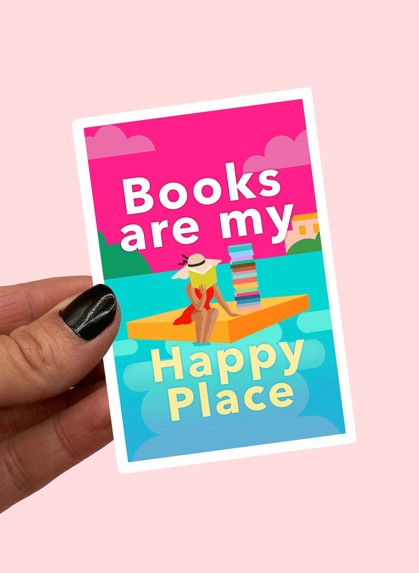 Books are my Happy Place Sticker held in front of a pink background.
