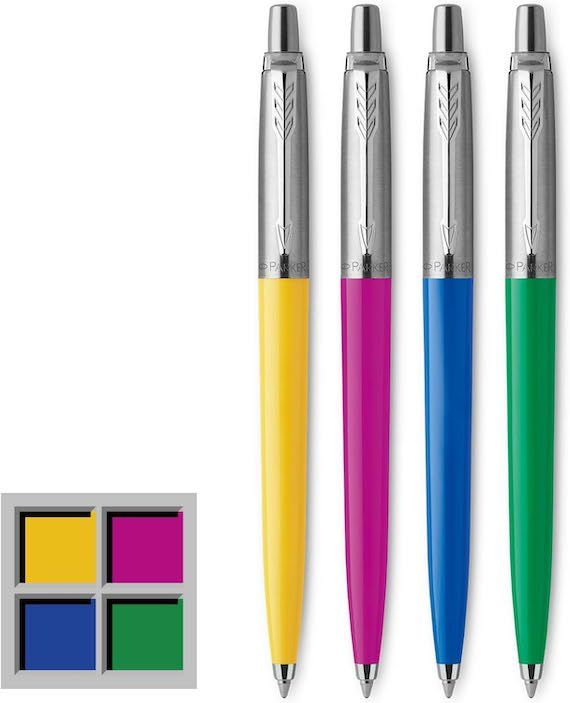 Four Parker Jotter ballpoint pens in yellow, magenta, blue, and green. 