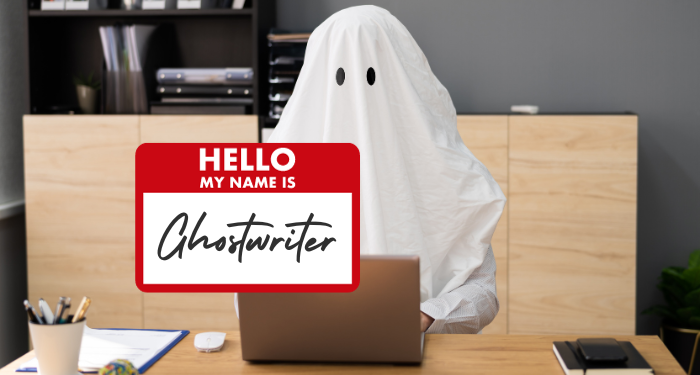 a photo of a person wearing a ghost costume writing on a computer. Superimposed is a nametag that says "Ghostwriter