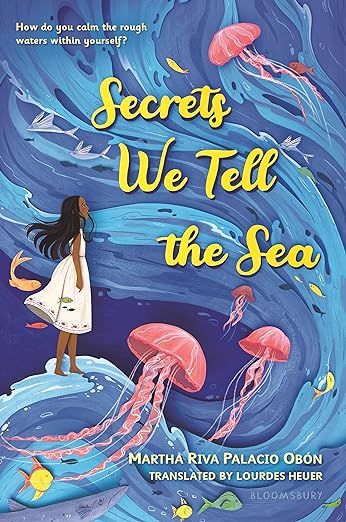 cover of Secrets We Tell the Sea by Martha Riva Palacio Obon; illustration of a young girl looking at a sea in the sky filled with pink jellyfish