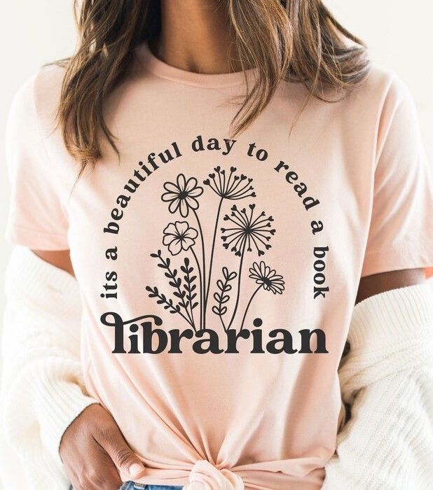 T-shirt with text reading "it's a beautiful day to read a book"