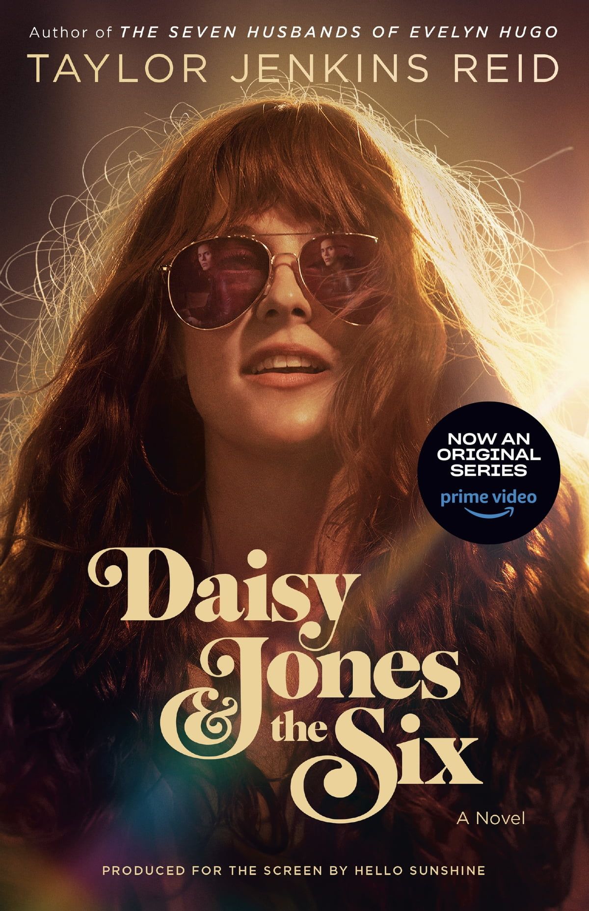 Daisy Jones and the Six book cover with image from Amazon Prime series on cover