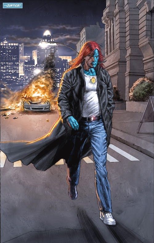 A splash page from Cry for Justice. Mikaal is striding down a city street at night, looking angry and determined. He wears a white tank top, blue jeans, and a black trench coat. There is a burning car behind him. A narration box reads " - justice!"