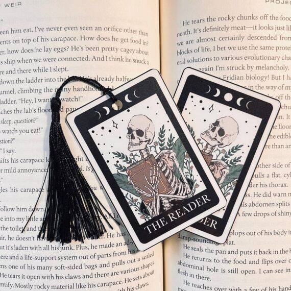 Skeleton with book tarot card bookmark labeled The Reader