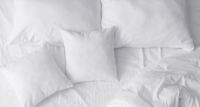 a photo of pillows on a bed