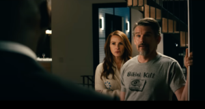 a shot from the Leave the World Behind trailer showing Julia Roberts and Ethan Hawke answering the door