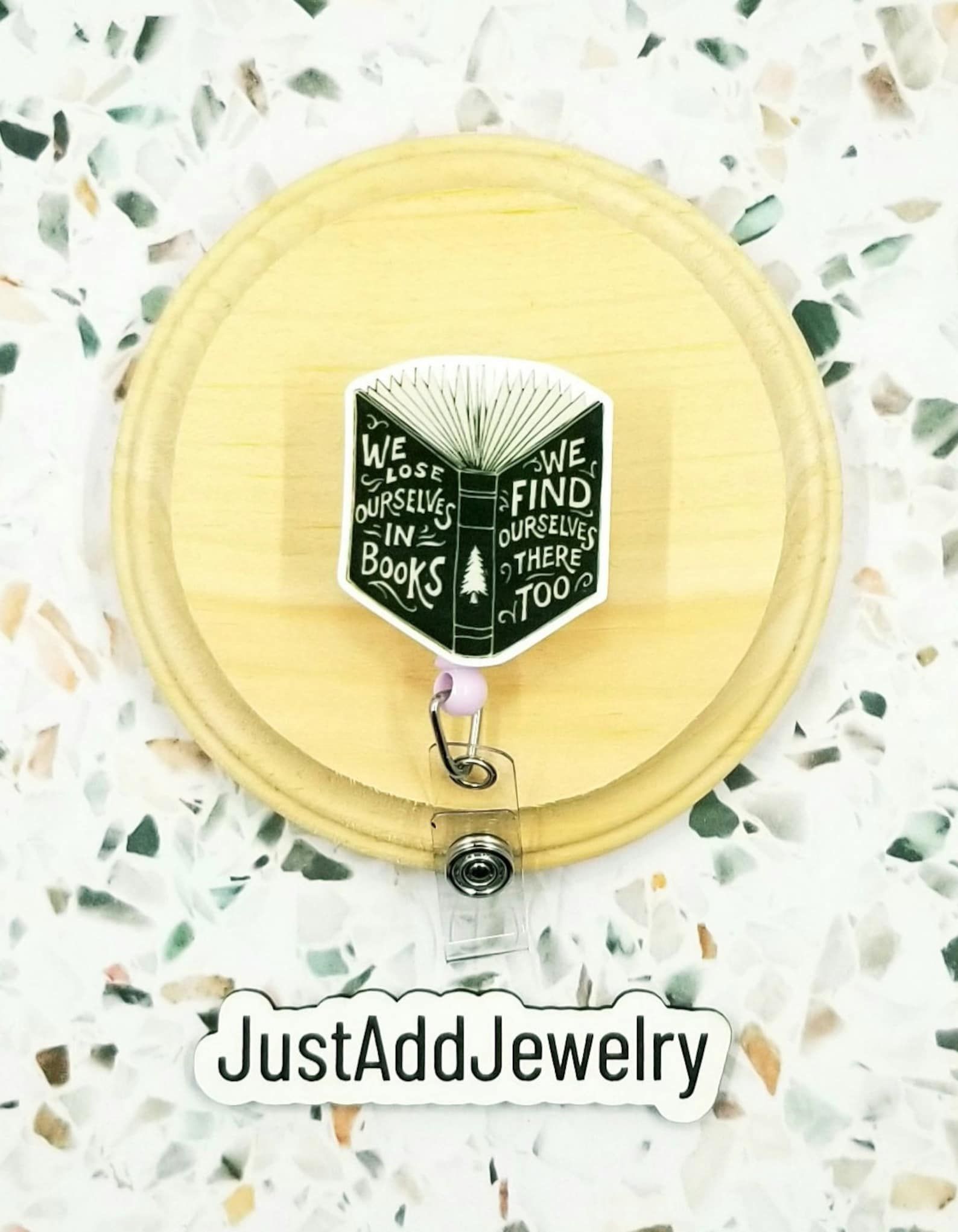 https://s2982.pcdn.co/wp-content/uploads/2023/11/bookish-badge-reel.jpeg.optimal.jpeg