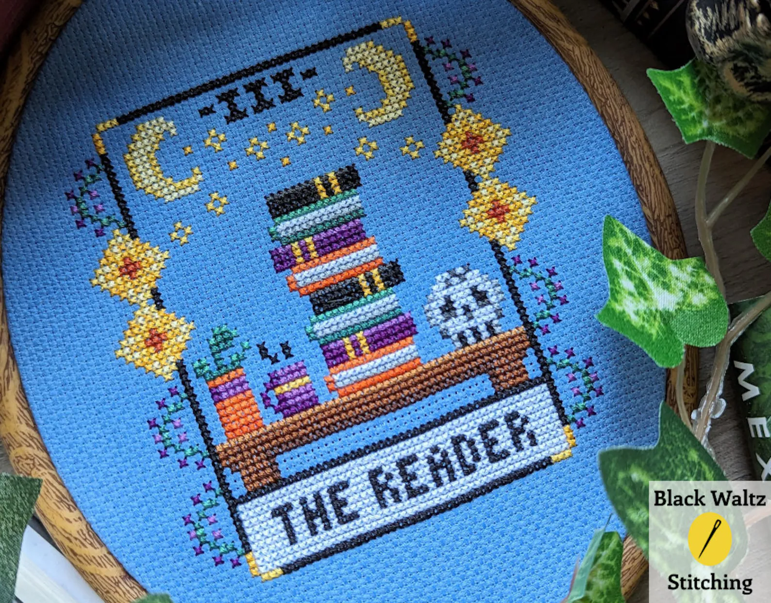 image of a cross stitch pattern inspired by tarot cards. It's called "the reader."