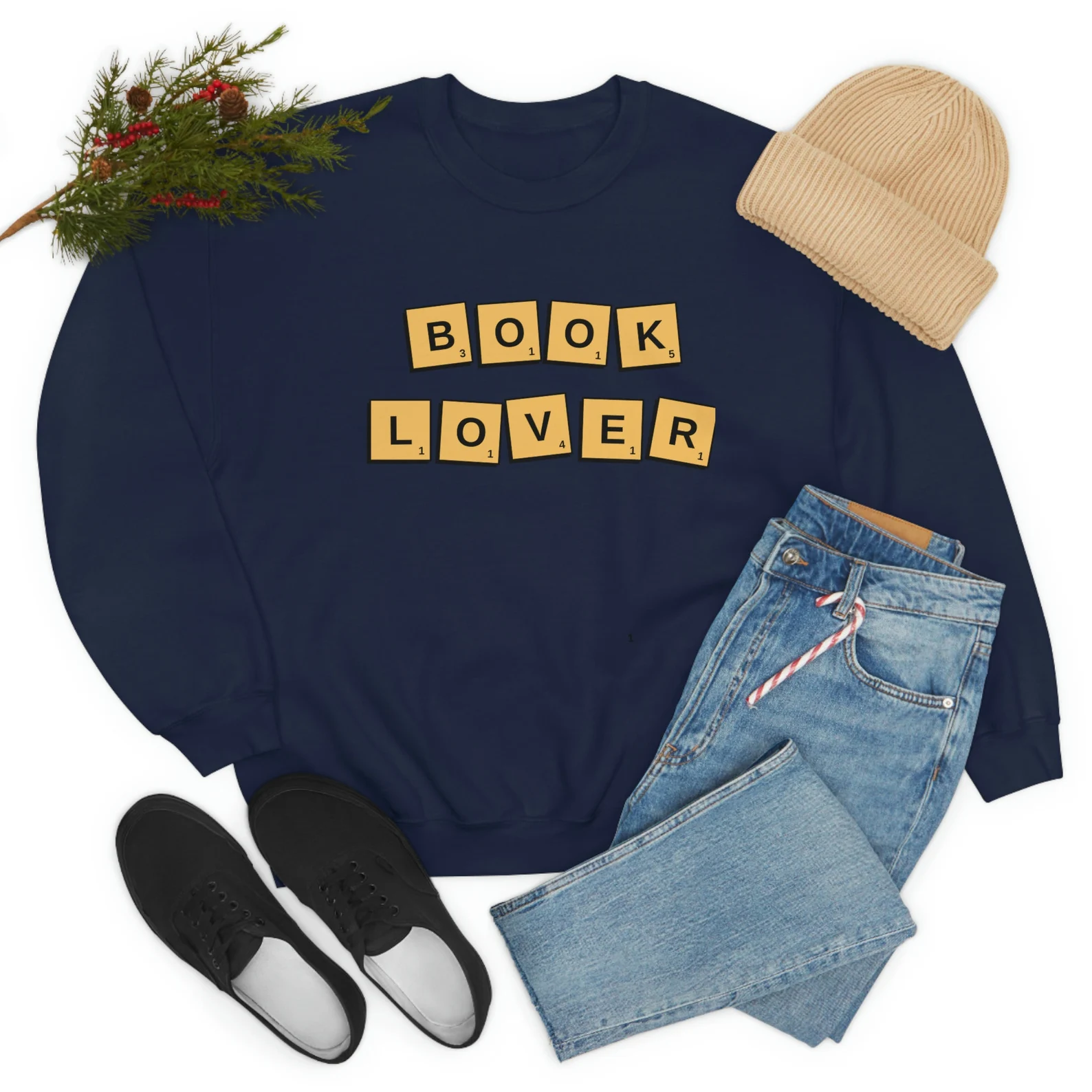 Image of a navy sweatshirt with Scrabble style letters spelling out "book lover."