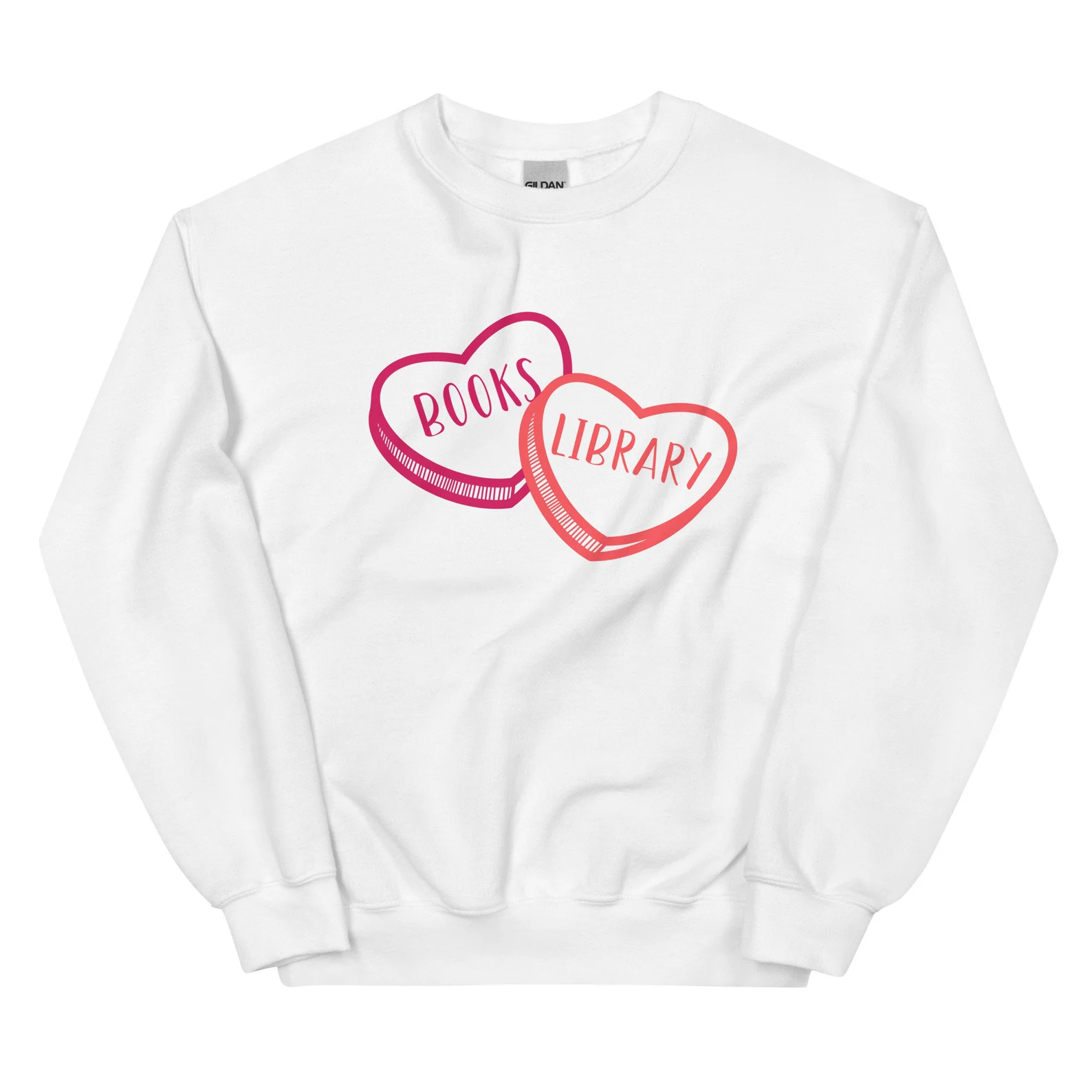 Image of a white sweatshirt with a pink and red sweetheart. Inside pink is the word "books" and inside red is the word "library."