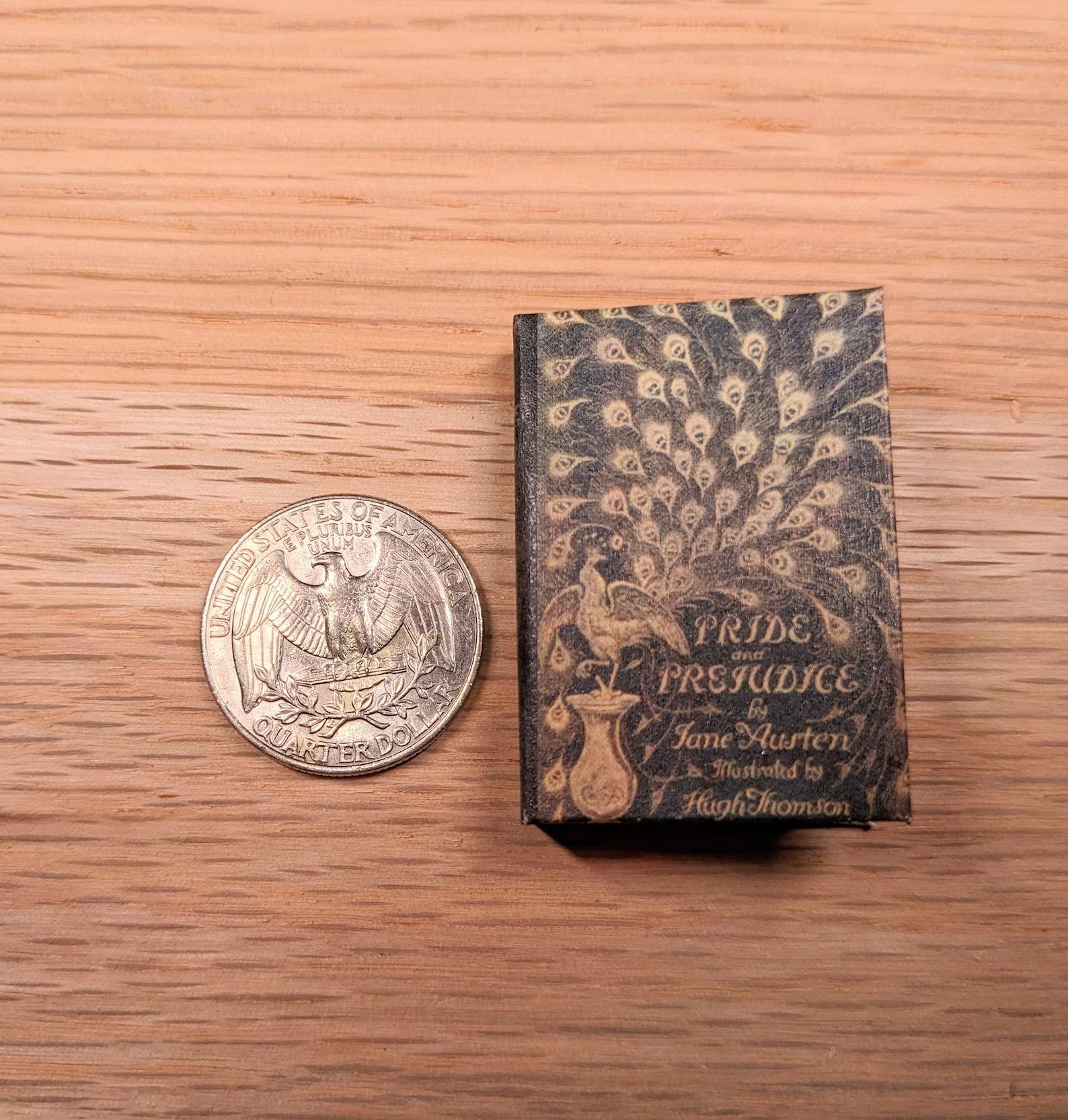 Mini Pride and Prejudice Hardcover next to an American quarter for size refrence.