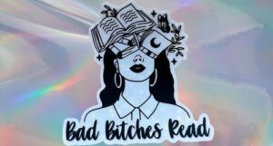 bad bitches read sticker against a holographic background