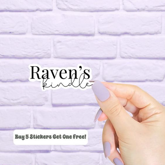 lavender painted wall with a white hand holding a sticker that says Raven's Kindle 