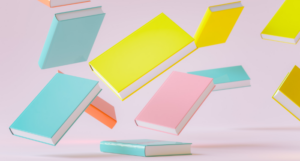 a graphic of pastel books falling through the air