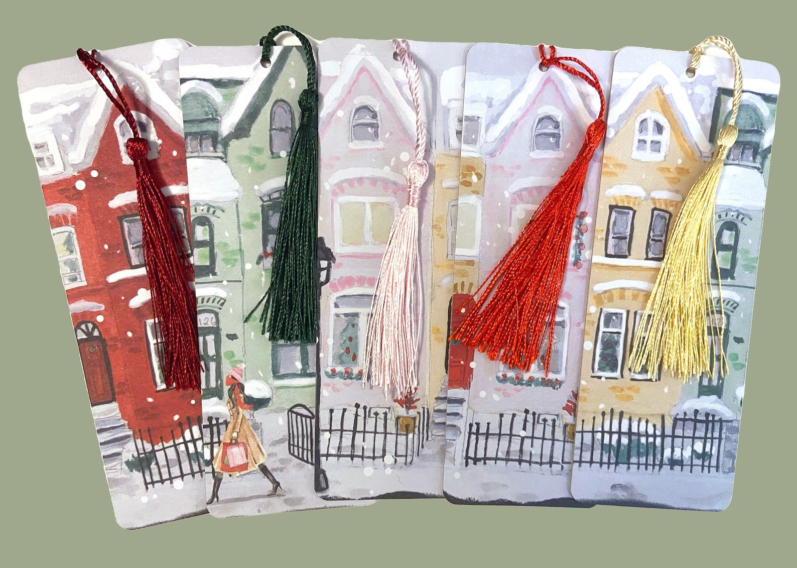 A set of five bookmarks depicting colorful townhouses in winter