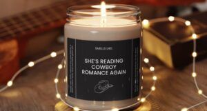 she's reading cowboy romance again candle