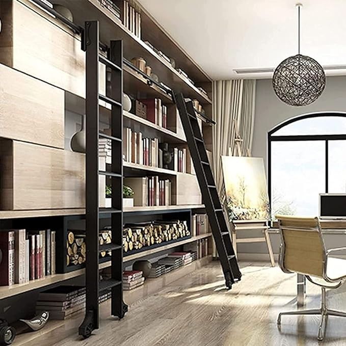 two retractable ladders on a rail on bookshelves