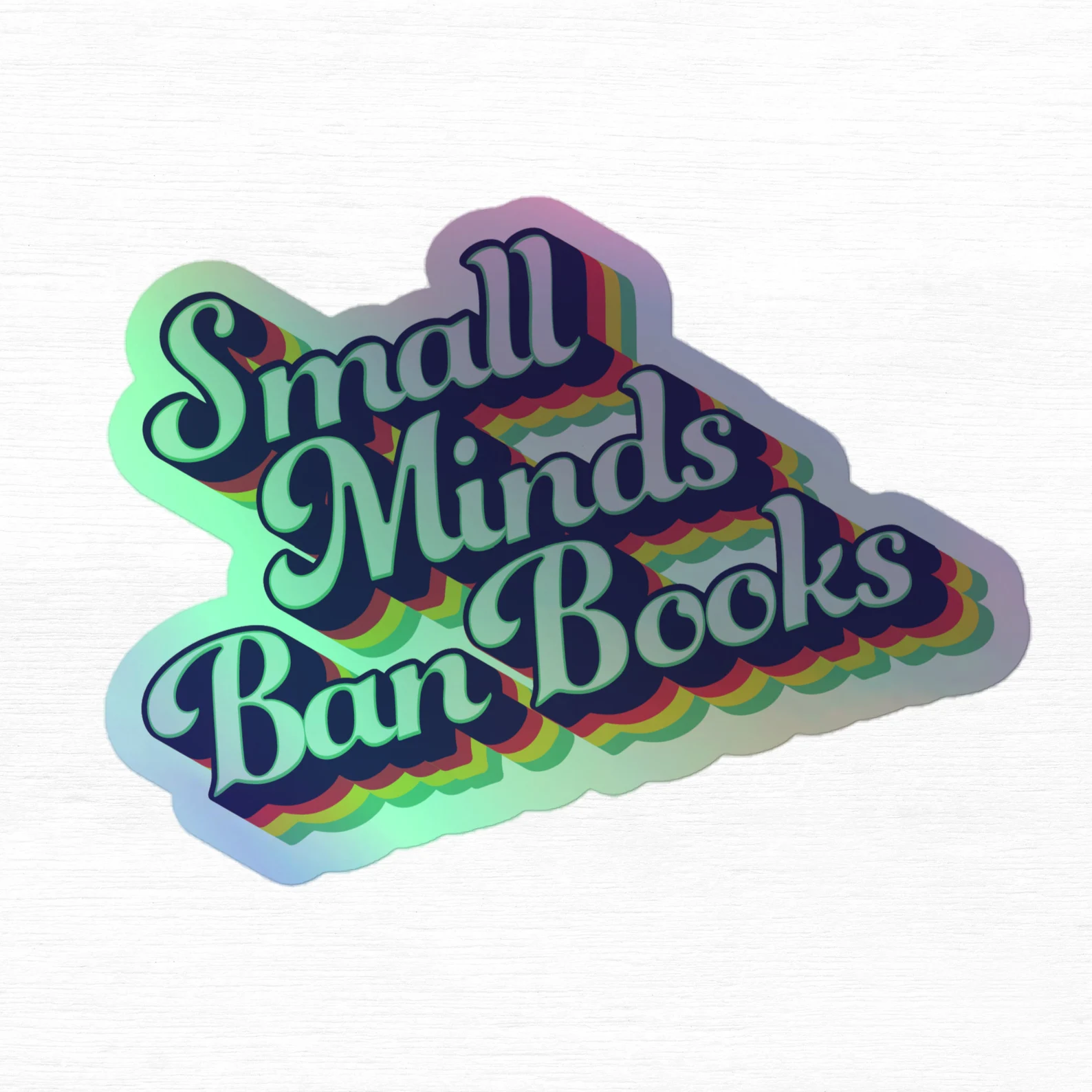 holographic sticker reading "small minds ban books."