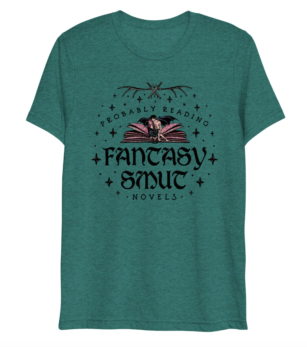 Image of a green t-shirt with a dragon and book illustration that says "probably reading fantasy smut novels"