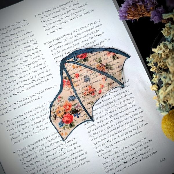 a single bat wing bookmark in a clear floral design
