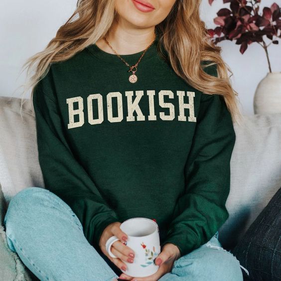 a dark sweatshirt with white letters that read "bookish" in the traditional college font 