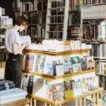 a photo of a person browsing a bookstore
