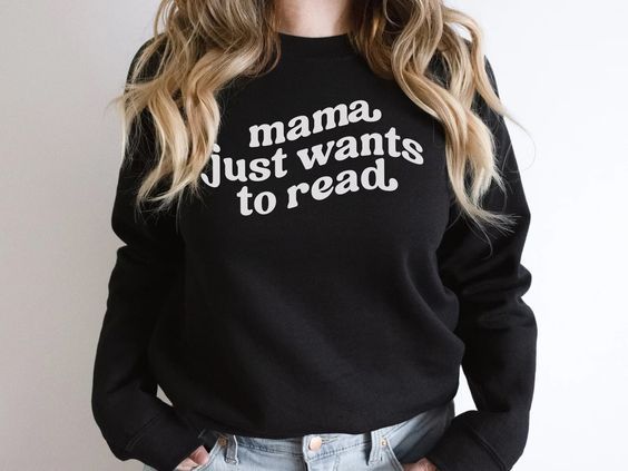 black sweatshirt with curvy font that says "mama just wants to read"