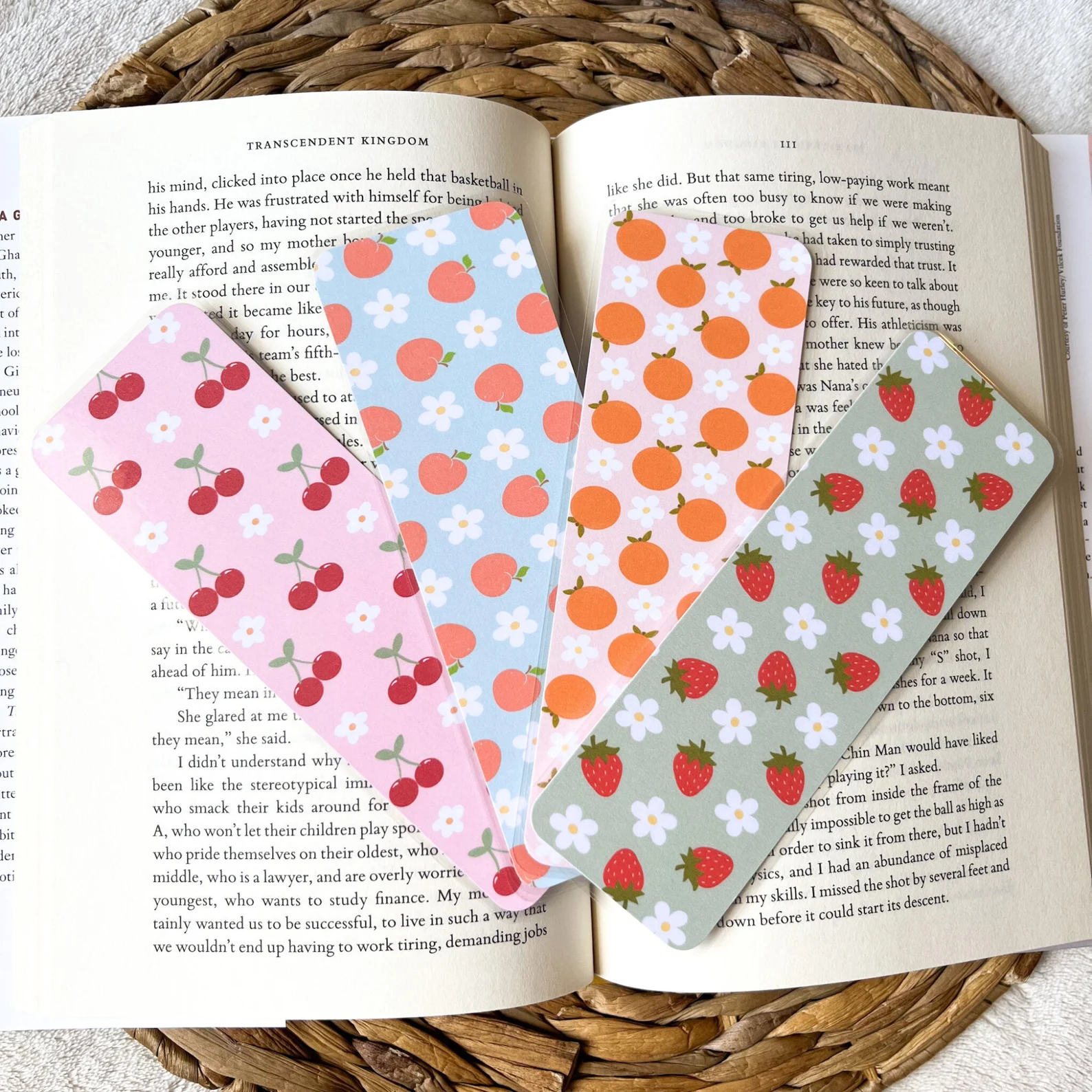 Image of four colorful fruit bookmarks.