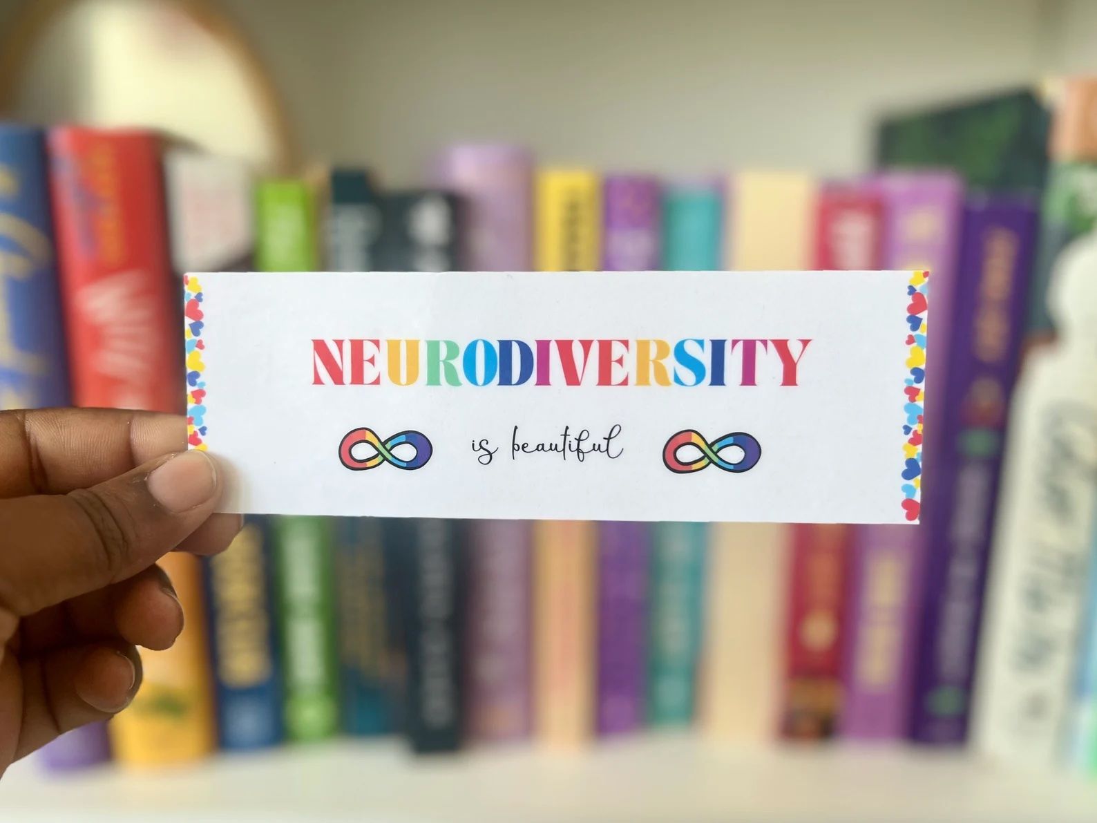 a graphic of the cover of a bookmark that reads, "Neurodiversity is beautiful."