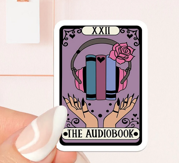 a sticker with graphic illustration of a tarot card that says "the audiobook"