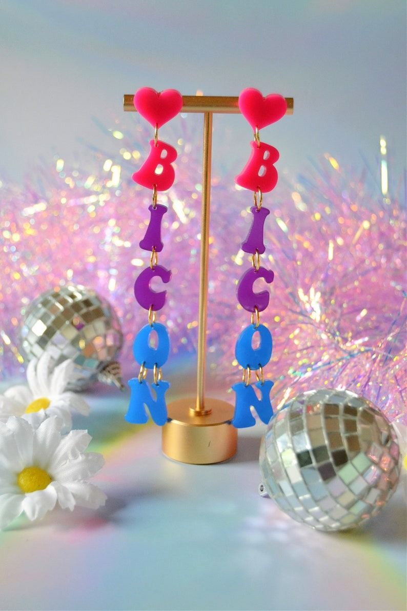 dangle earrings that spell out BICON