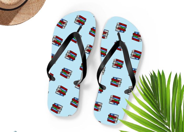 sandals with pictures of books on them