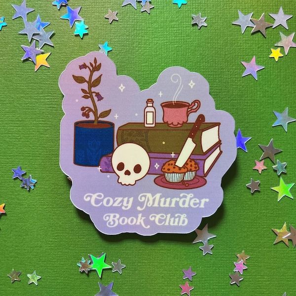 a lavender enamel sticker with a graphic of a plant, skull, and stack of books. white text beneath the images reads "cozy murder book club"