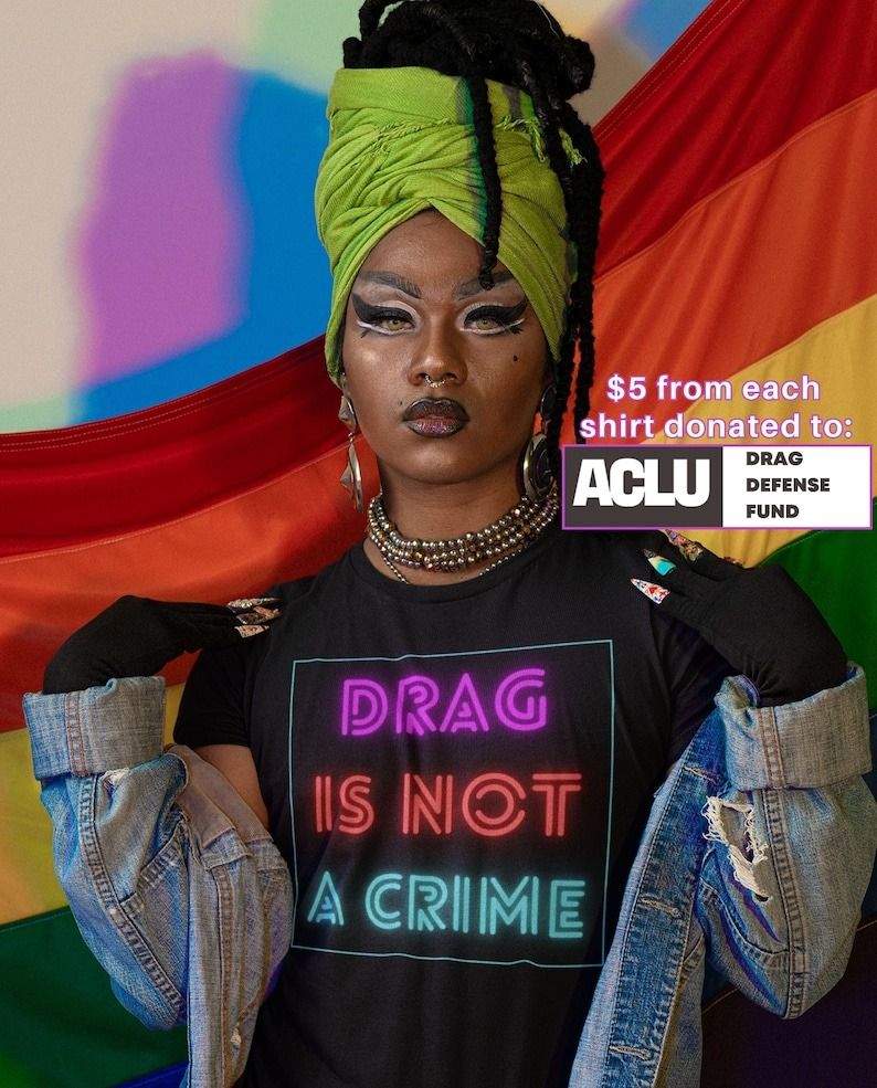 a photo of someone wearing a shirt that says Drag Is Not a Crime