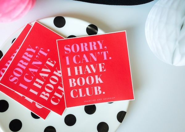stack of red enamel stickers with text that reads "sorry I can't, I have book club"