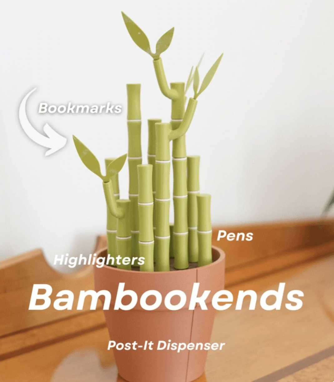 Image of two bookends designed to look like bamboo in a ceramic pot, but the bamboo shoots are actually disguised pens, highlighters, and bookmarks