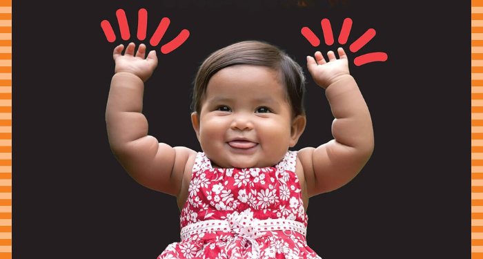 a cropped cover of Hello Hands showing a baby raising their arms above their head