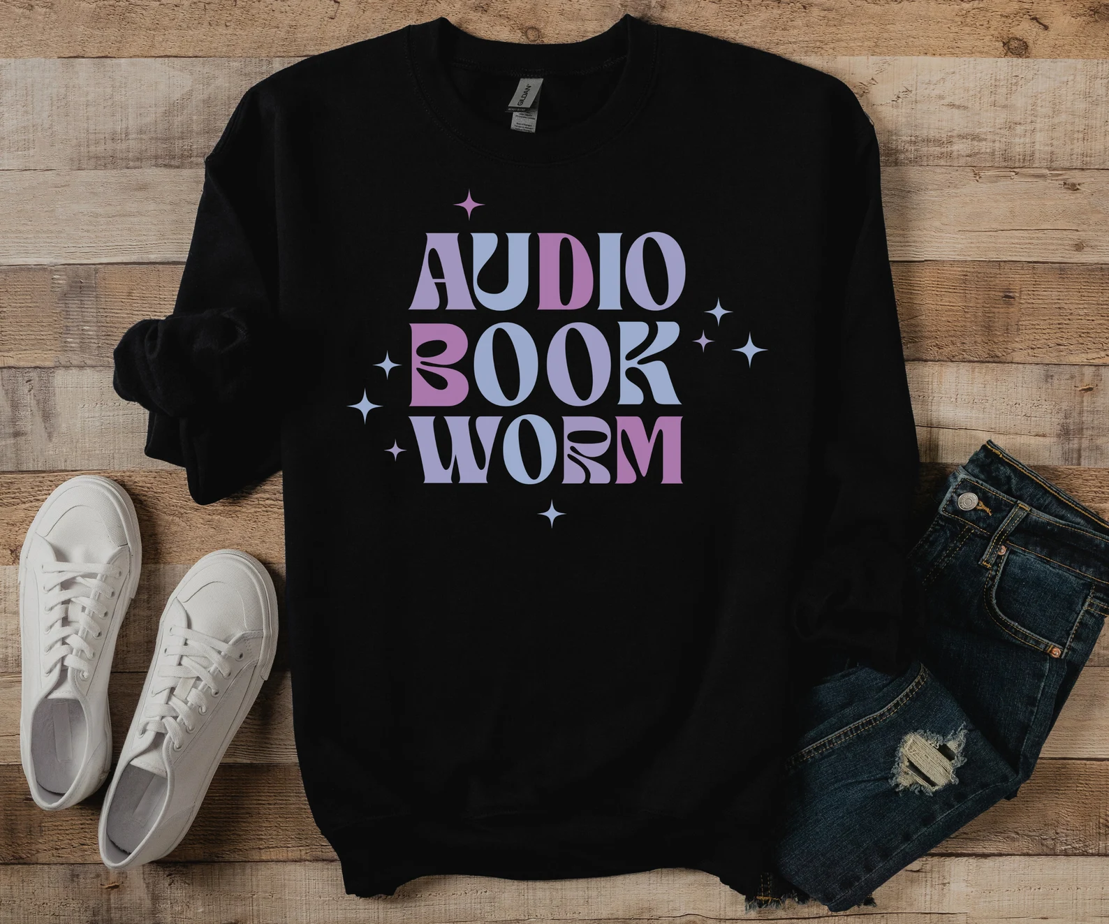 black sweatshirt with the words "audiobook worm."