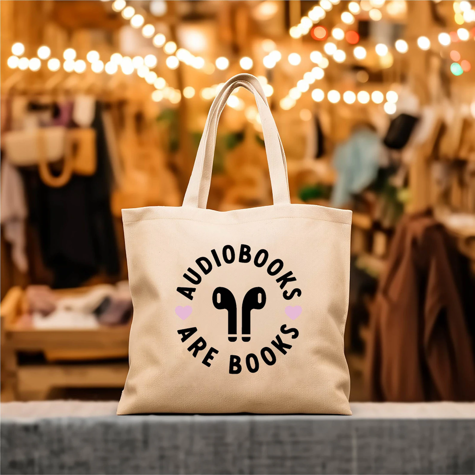 canvas tote bag that says audiobooks are books.