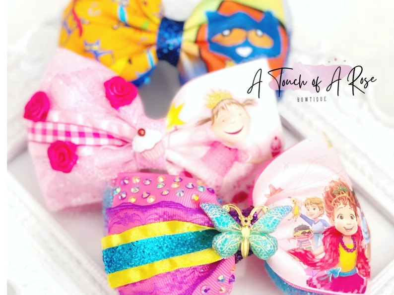 Hairbows with storybook characters on them