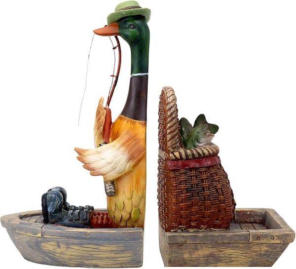 a set of bookends. the bookend on the left is of a mallard duck holding a fishing pole, and the one on the right is a basket with fish in it