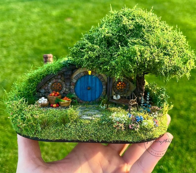 a diorama of a hobbit hole