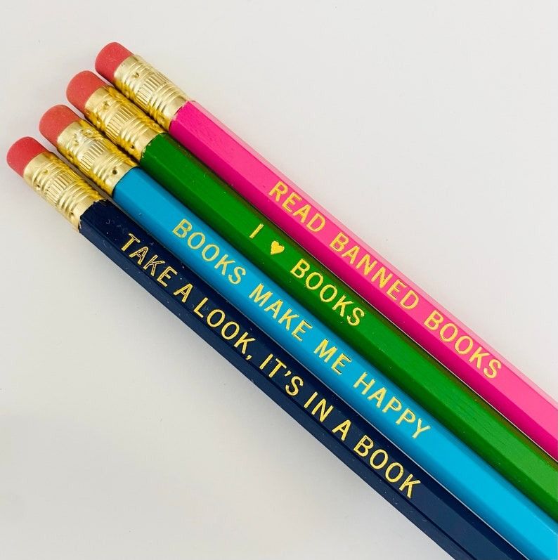 pencils with sayings like "Read Banned Books" and "Books Make Me Happy"