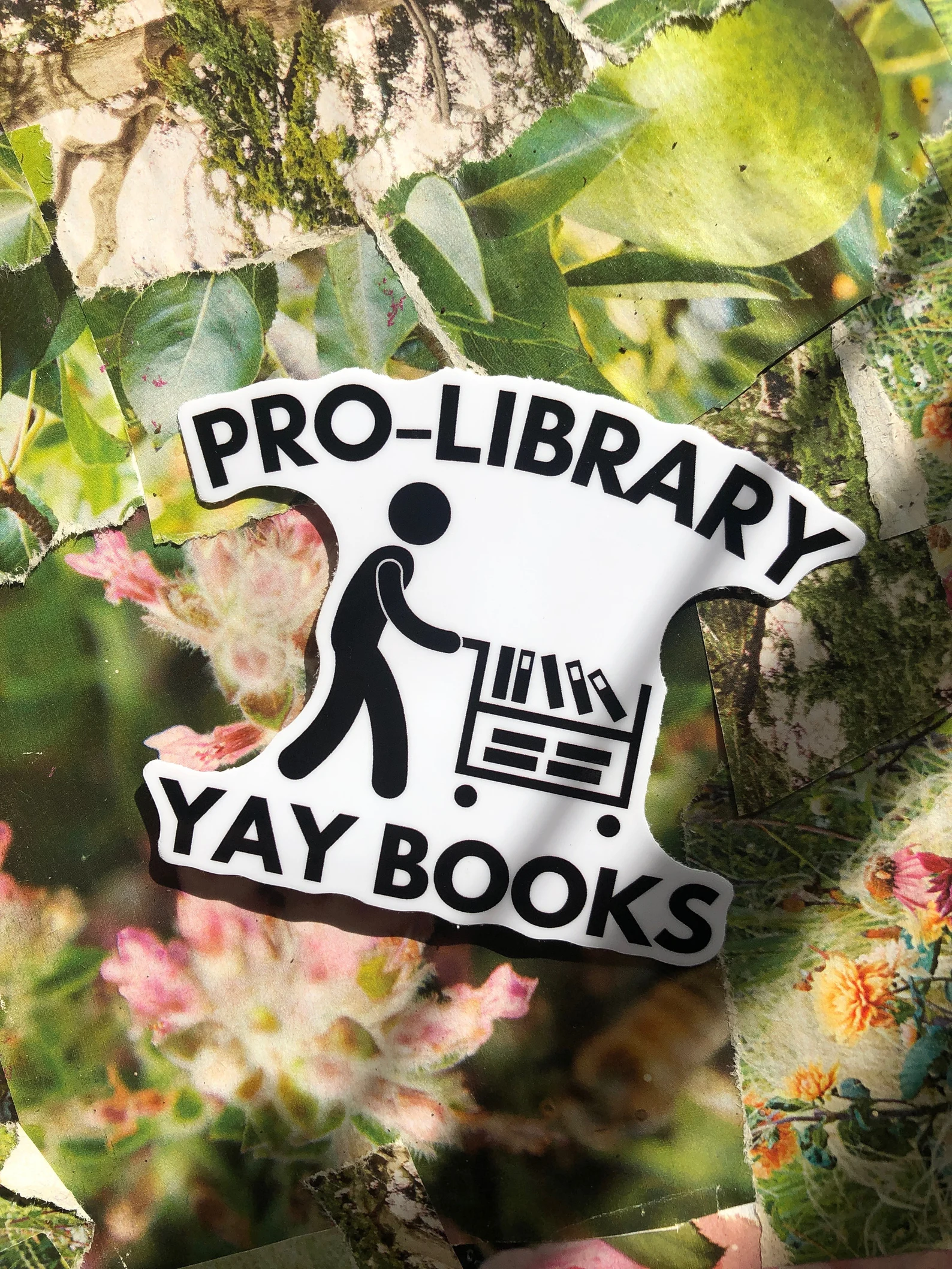 sticker that says "pro-library, yay books."