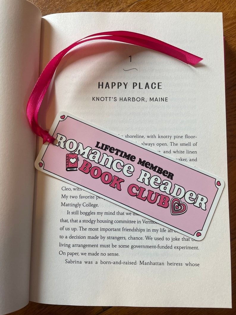 a pink bookmark with the text Romance Reader Book Club, Lifetime Member