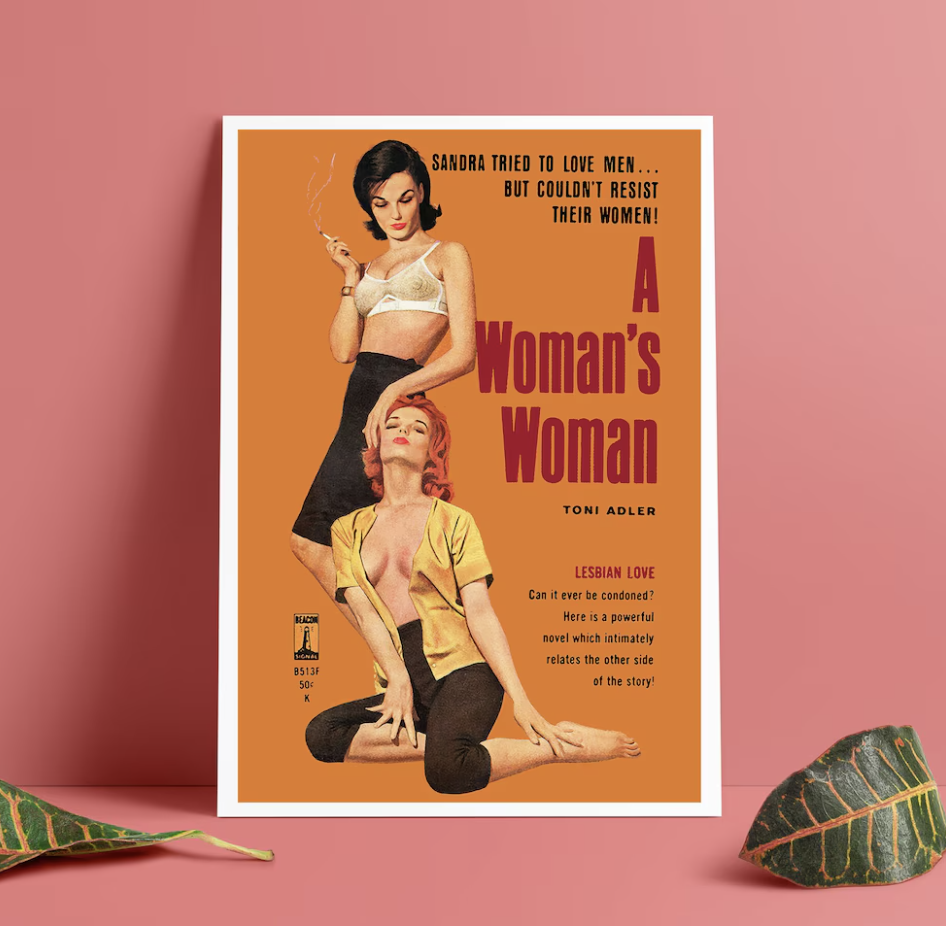 Image of an art print of a lesbian pulp novel cover with two risque half-clothed 1950s women with the title "A Woman's Woman"