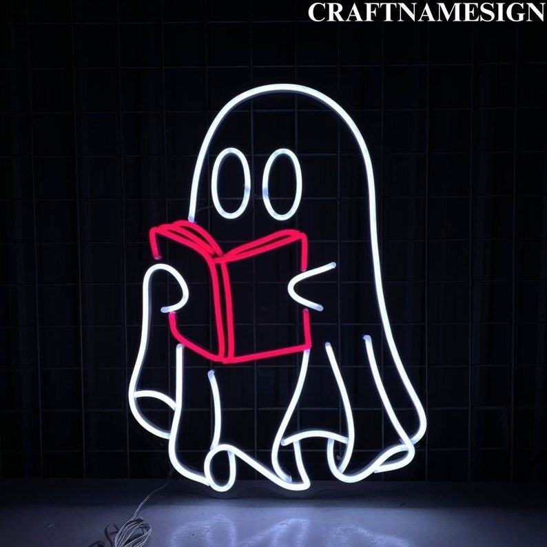 a neon sign of a ghost reading