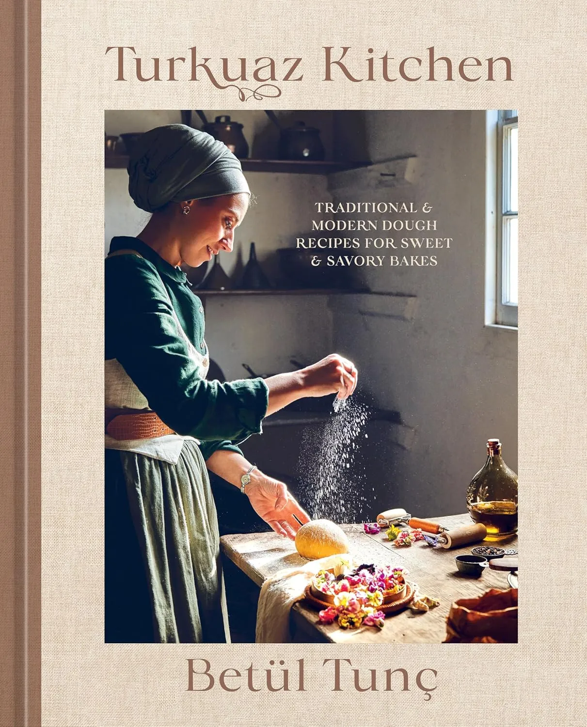 a graphic of the cover of Turkuaz Kitchen: Traditional and Modern Dough Recipes for Sweet and Savory Bakes: A Baking Book by Betül Tunç